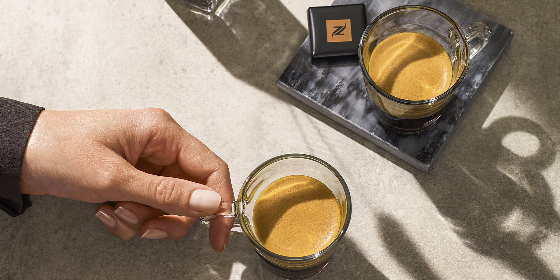 Symbolbild Nespresso mit einem Kaffeeh&auml;ferl  